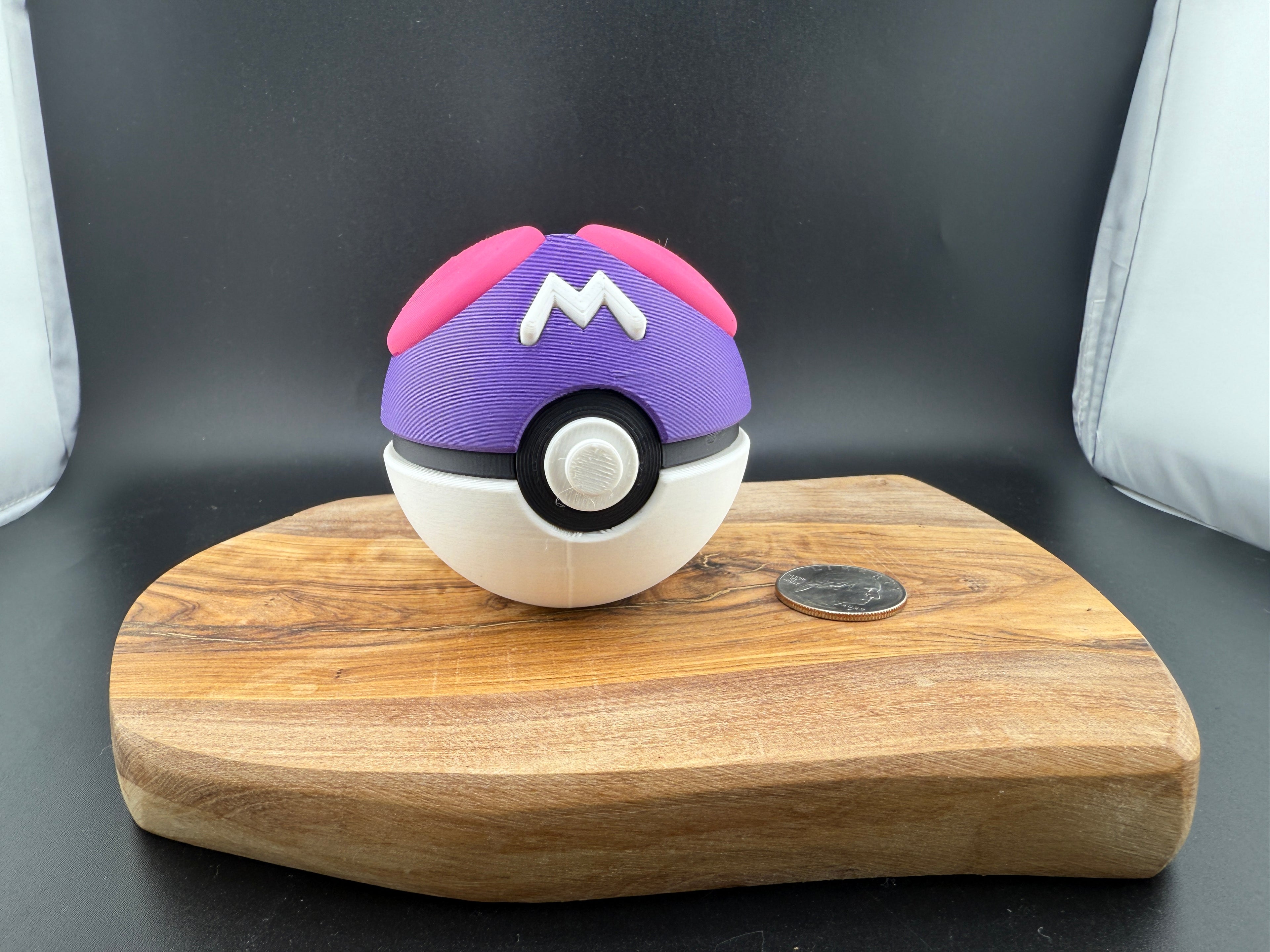 Purple and Pink ball on a wooden platform. 