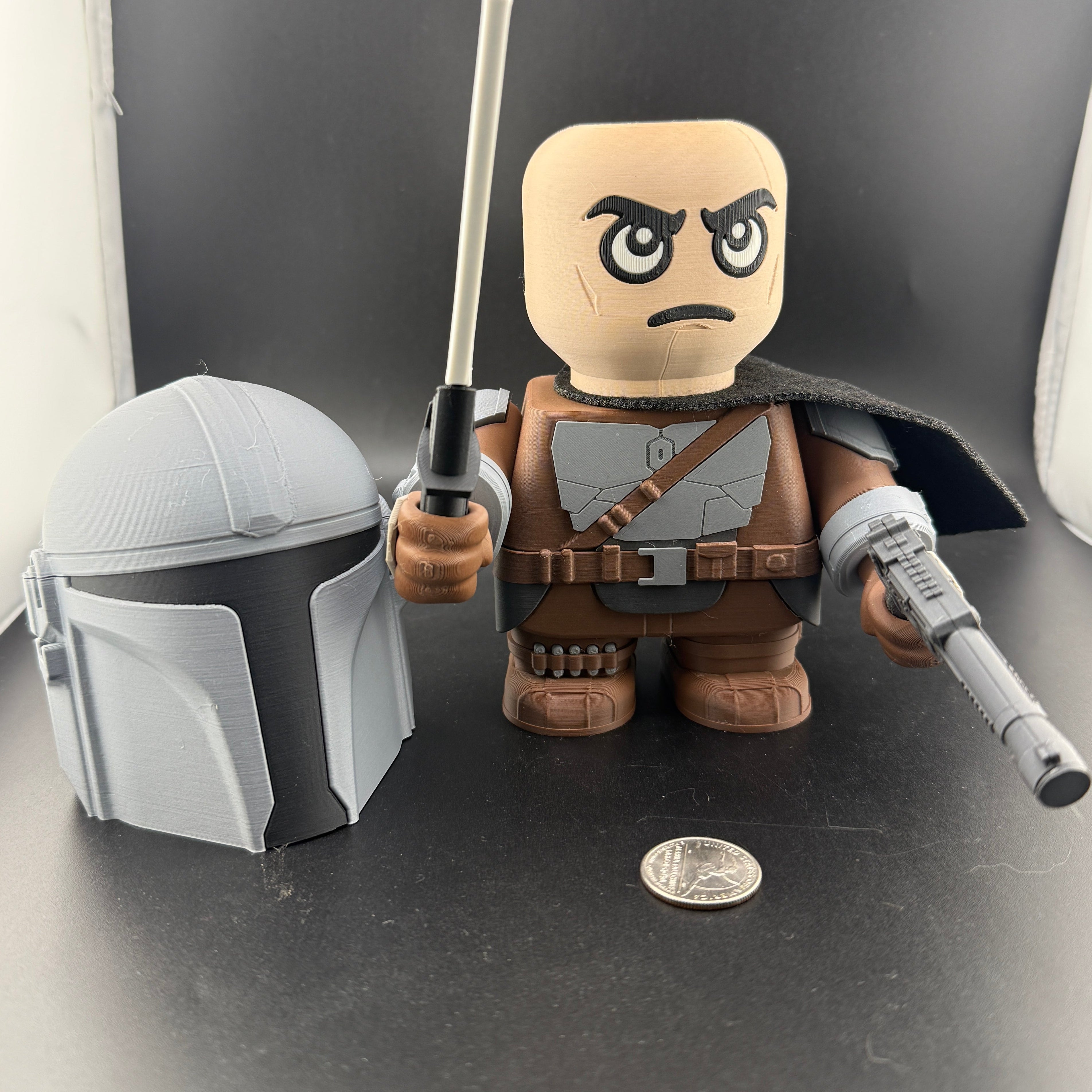 Toy figure of a character from a popular franchise on a dark surface with a coin for scale.