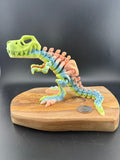 3d printed dinosaur skeleton on a dark background. 