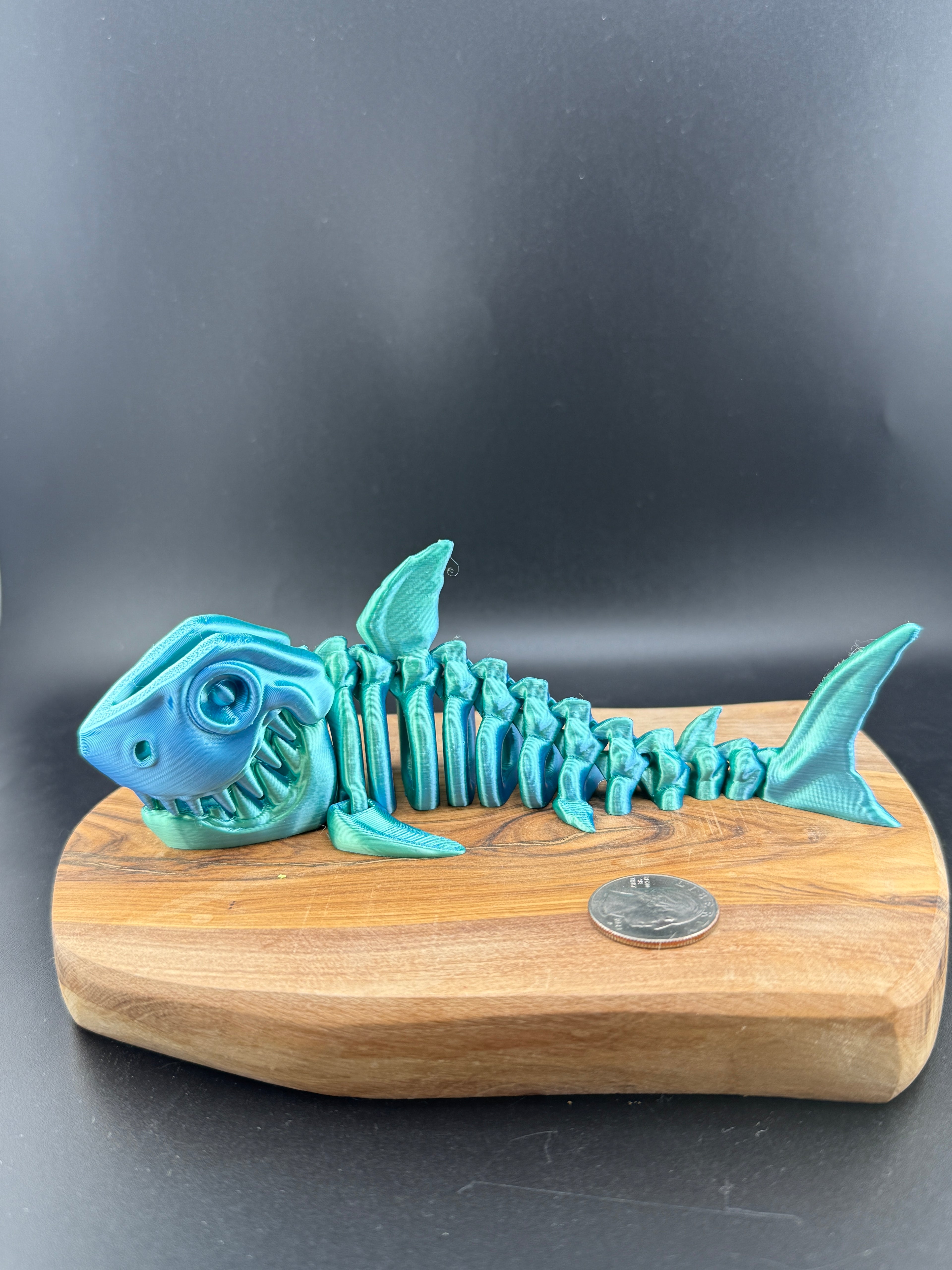 3d printed dinosaur skeleton on a dark background. 
