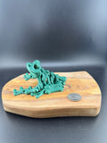 3d printed dinosaur skeleton on a dark background. 
